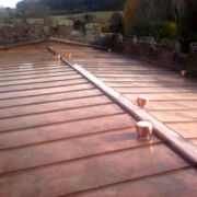 Renewed copper roof with gutter linnings and spun metal vent tops at St. Mary's, Stoke-sub-Hamdon, Somerset © Mike White Ltd