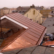 Example of copper standing seam roofing at West Bay, Dorset © Mike White Ltd