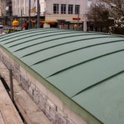 Nordic green prepatinated copper standing seam roof in Plymouth city centre, Devon © Mike White Ltd