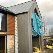 VM Zinc Quartz plus fully covered gable section to a new build house, Dorset