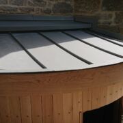 VM Zinc Quartz roof with a curved stainless steel secret gutter lining, St Stephens Church, Charlton Musgrove,Wincanton