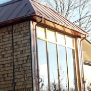 Arubis bright half hard copper roofing, cladding and guttering to a private house at Cerne Abbas, Dorset