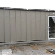 VM Zinc Quartz Plus cladding, roofing and guttering to a stairwell fire exit at Taunton School