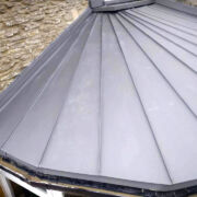 Fan shaped conservatory roof in VM Zinc Quartz Plus